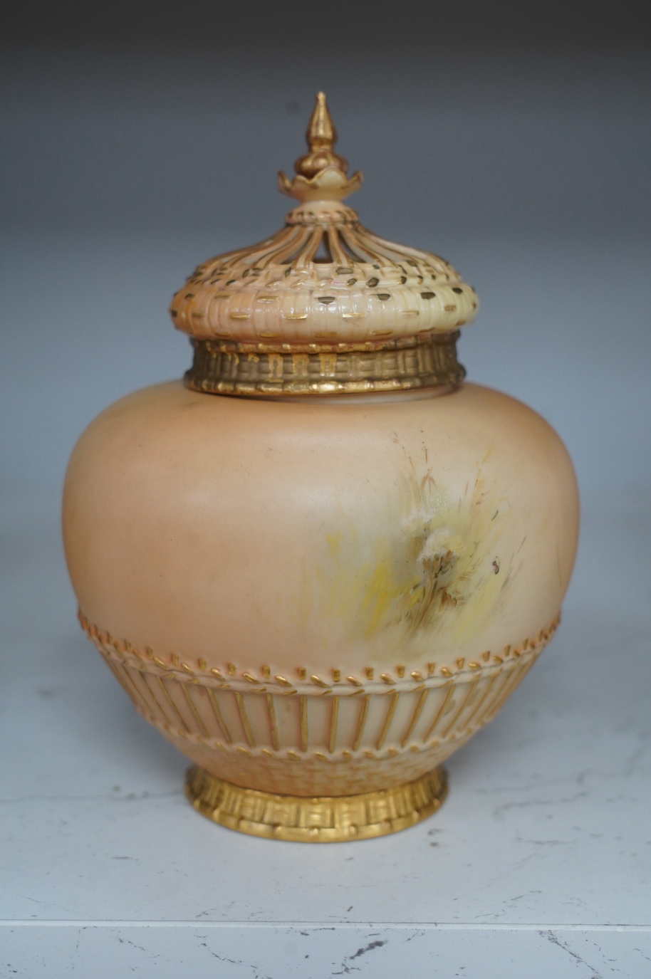 A Royal Worcester bird painted pot pourri and cover, painted by E. Barker, model number 1286, 19cm. Condition - good